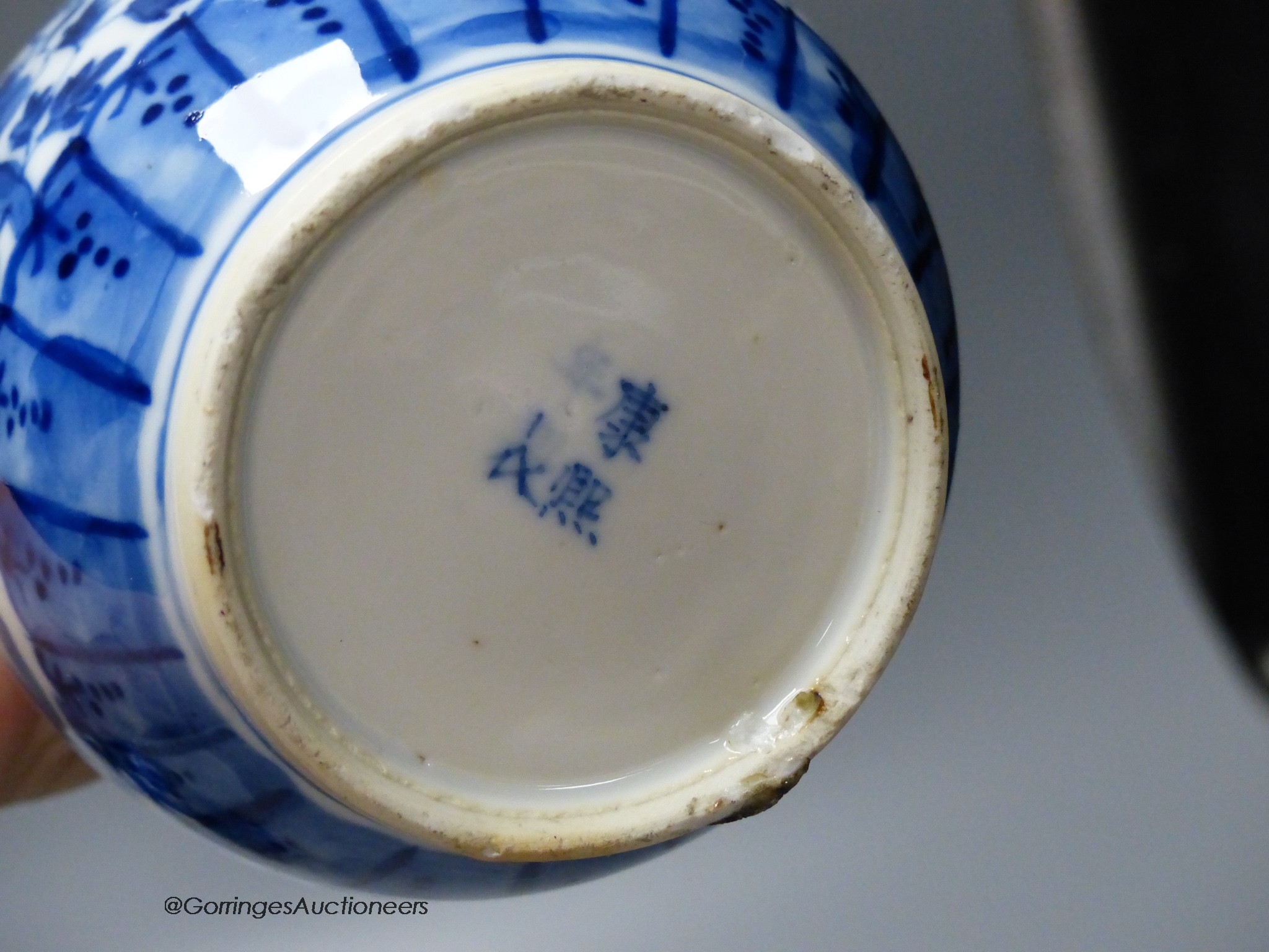 A pair of Chinese blue and white 'dragon' bottle vases, a prunus jar and cover, all late 19th century